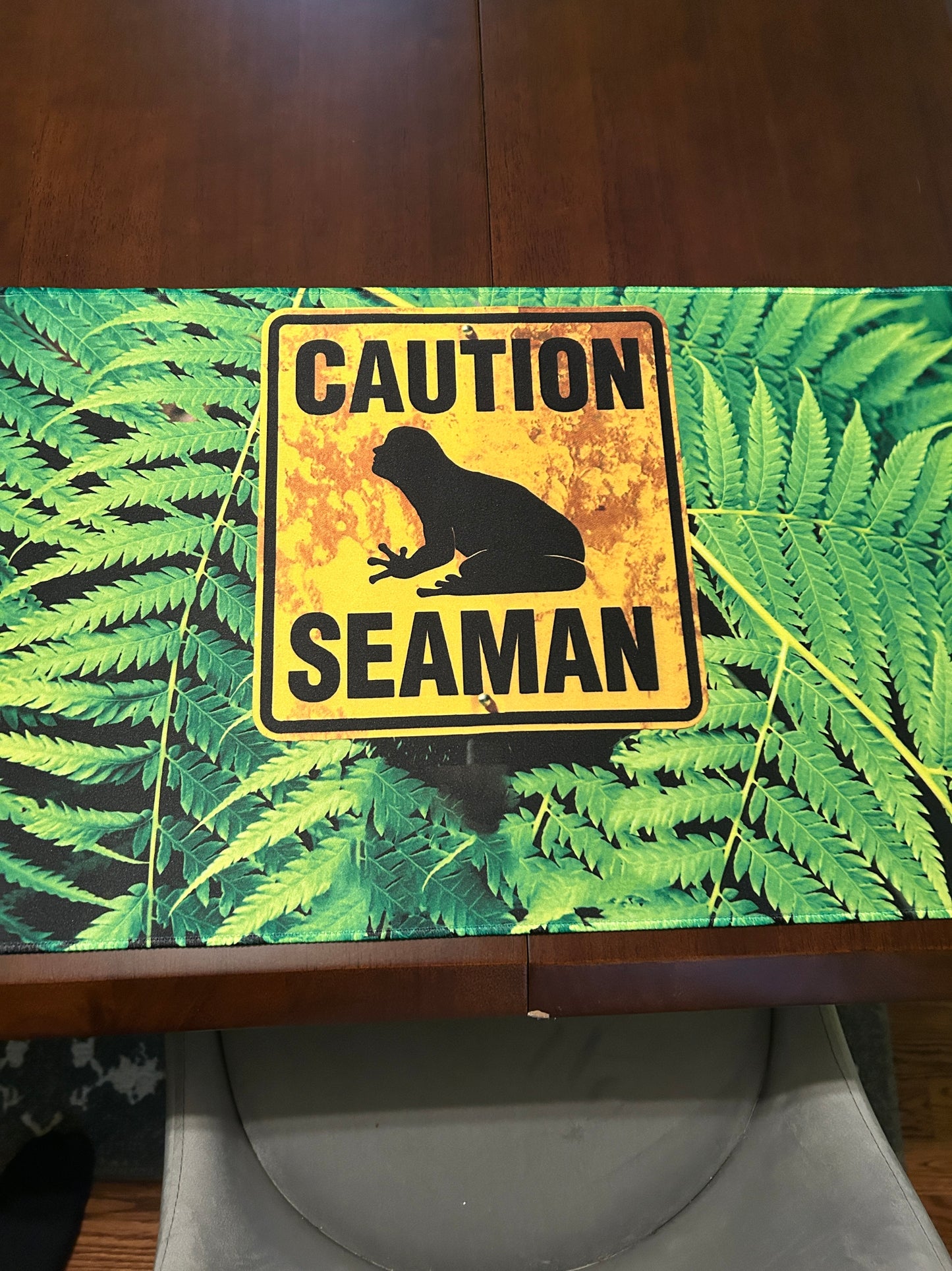 CAUTION Seaman desk game mat